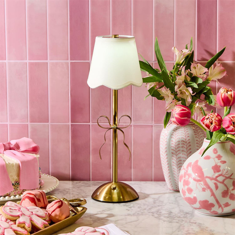 Gold Bow Side Table Lamp that is LED, portable and Cordless